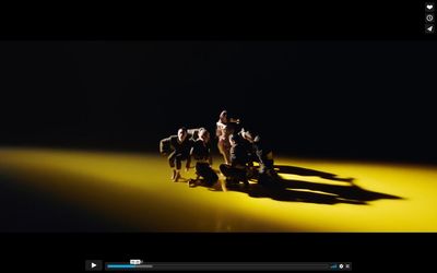 a group of people standing on top of a yellow floor