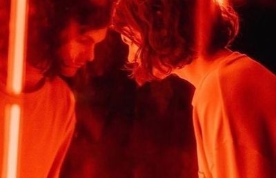 a man and a woman standing next to each other