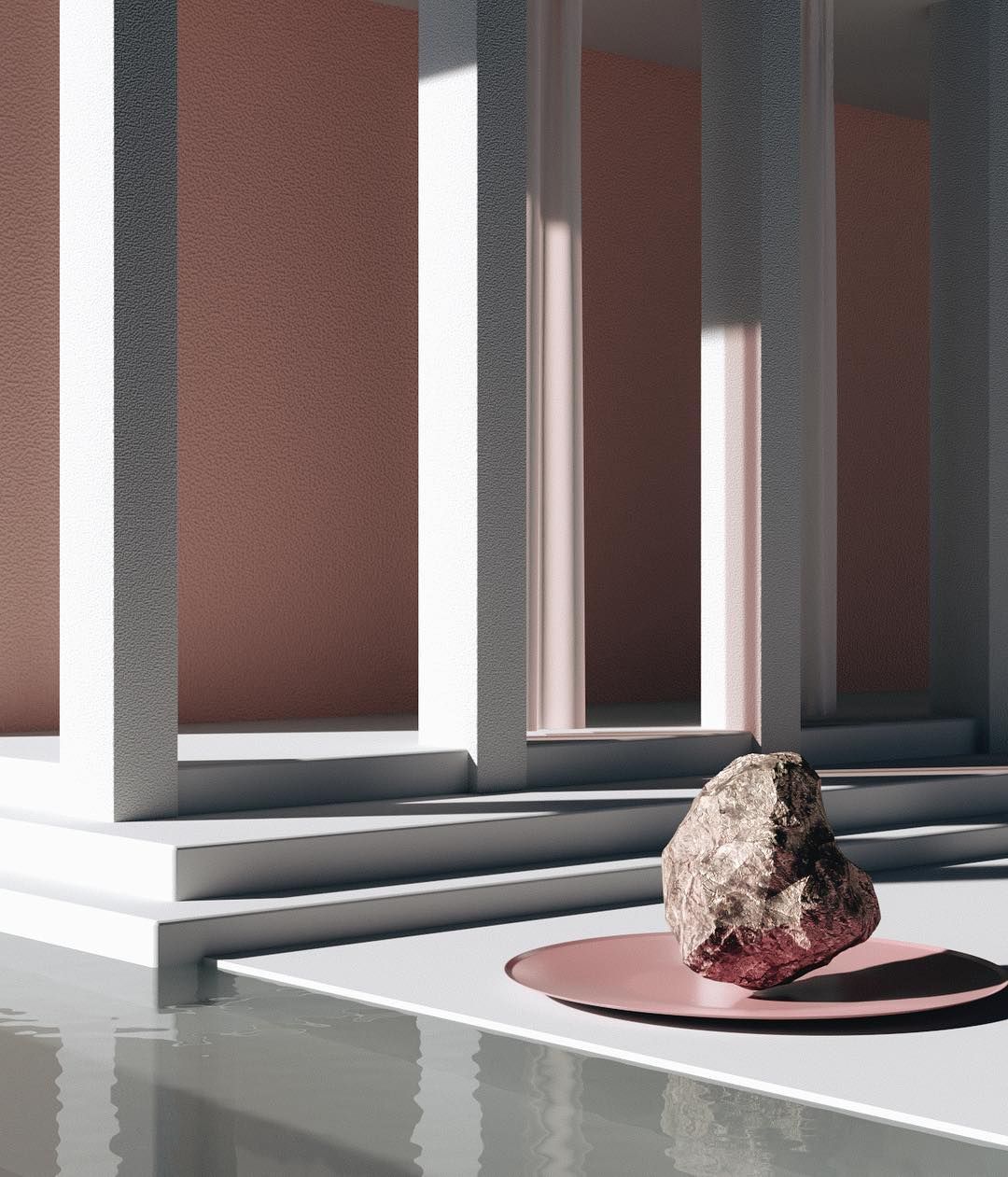 a rock sitting on top of a white table