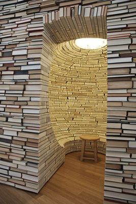 a room made out of stacks of books