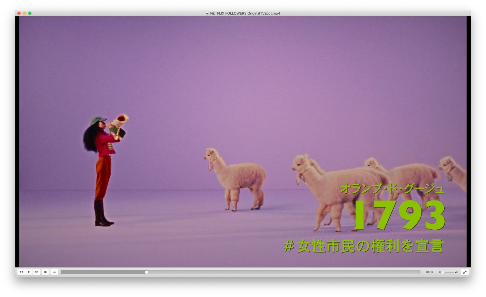 a man in a red suit is standing in front of a group of sheep