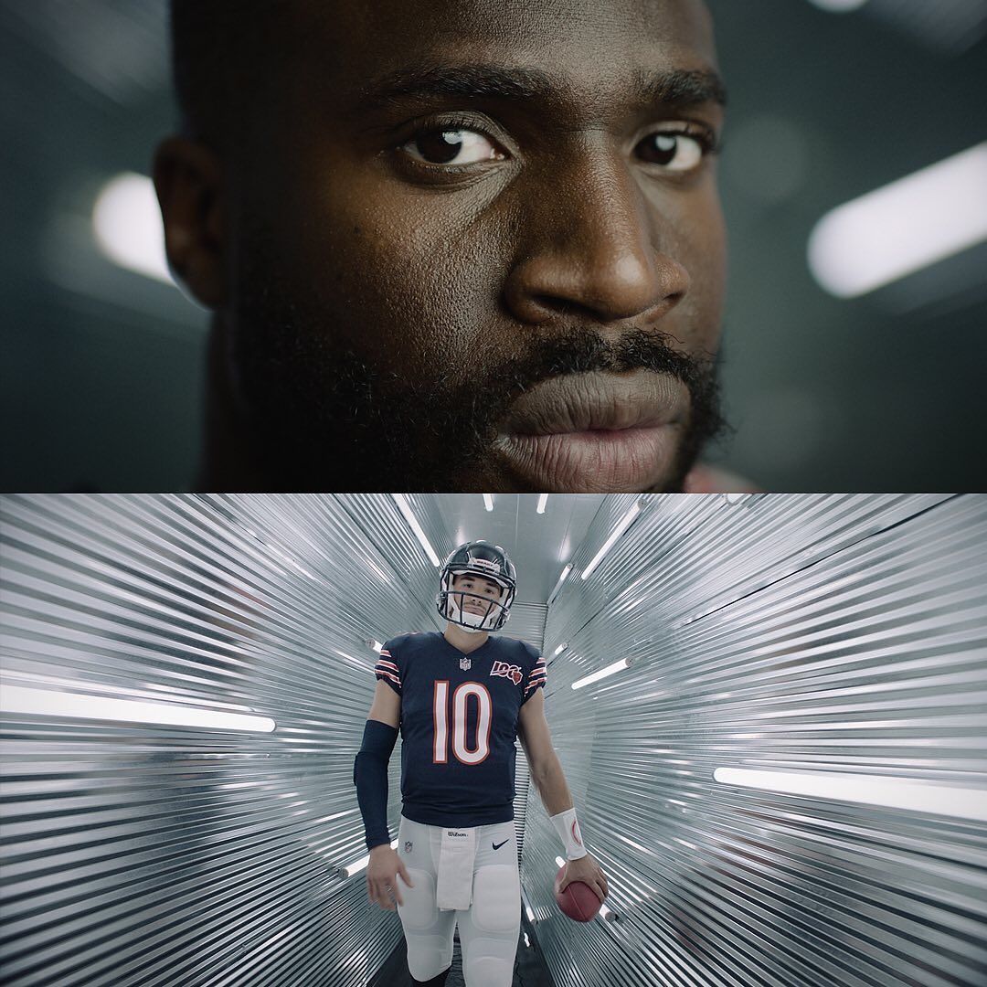 a man with a football uniform and a picture of him