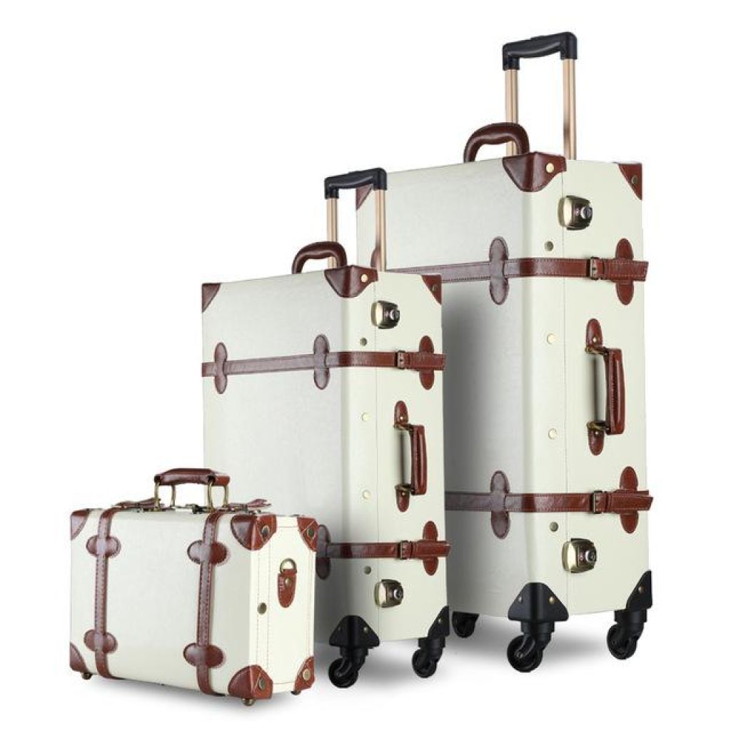 three pieces of luggage sitting next to each other