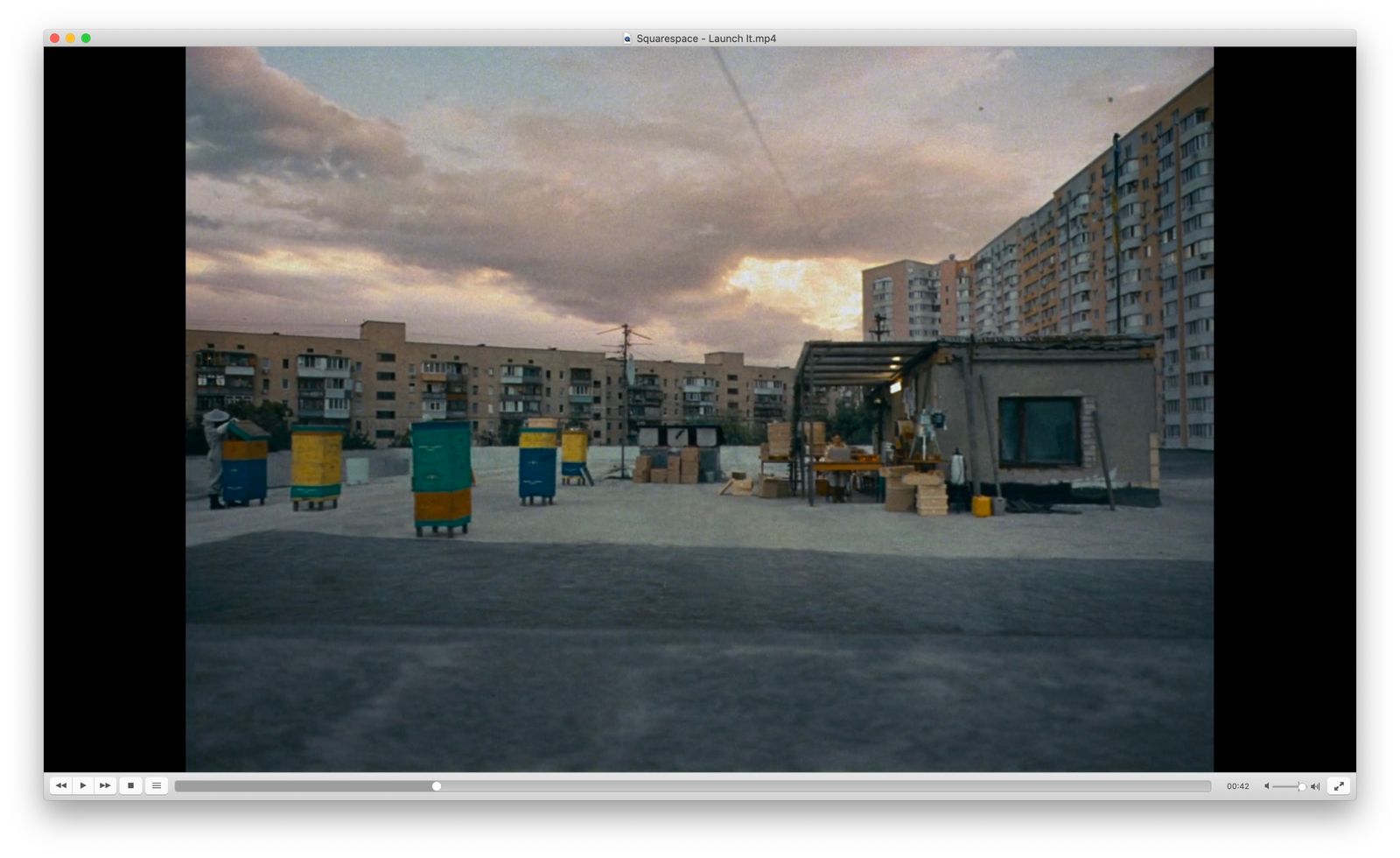 a picture of a building with a sky in the background