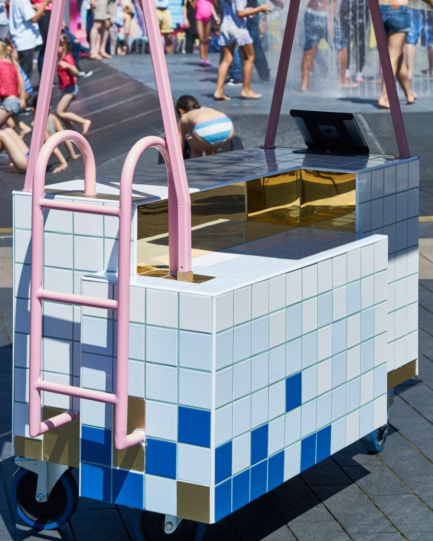 a small cart with a pool on top of it