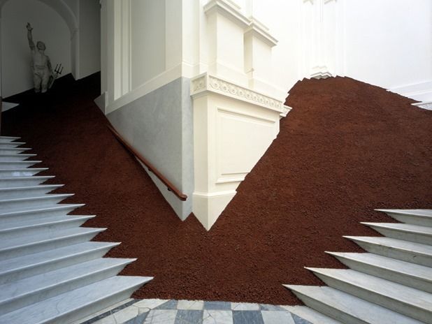 a staircase leading up to a white building