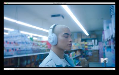 a man wearing headphones in a store