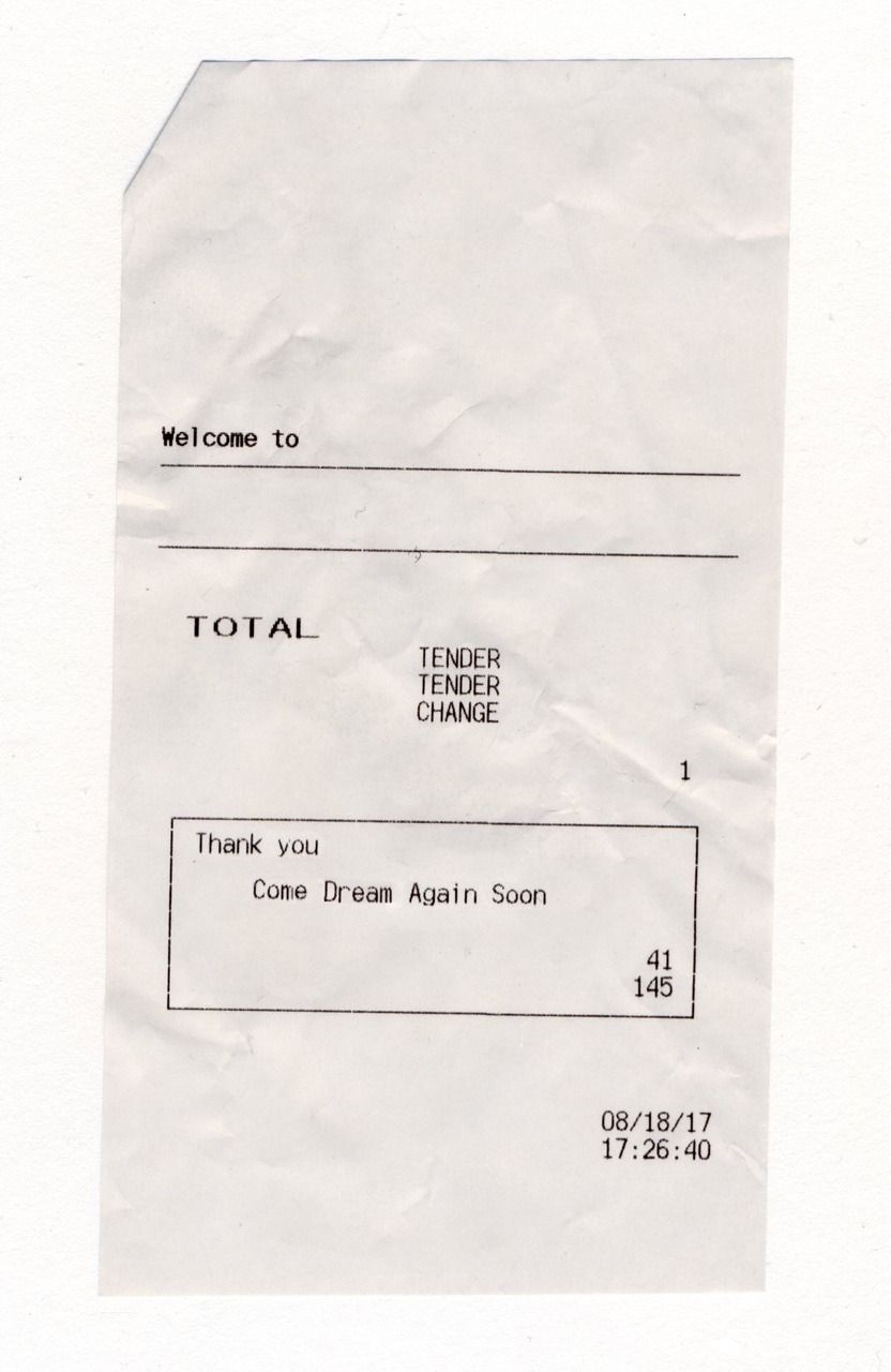 a piece of paper with a check card on it