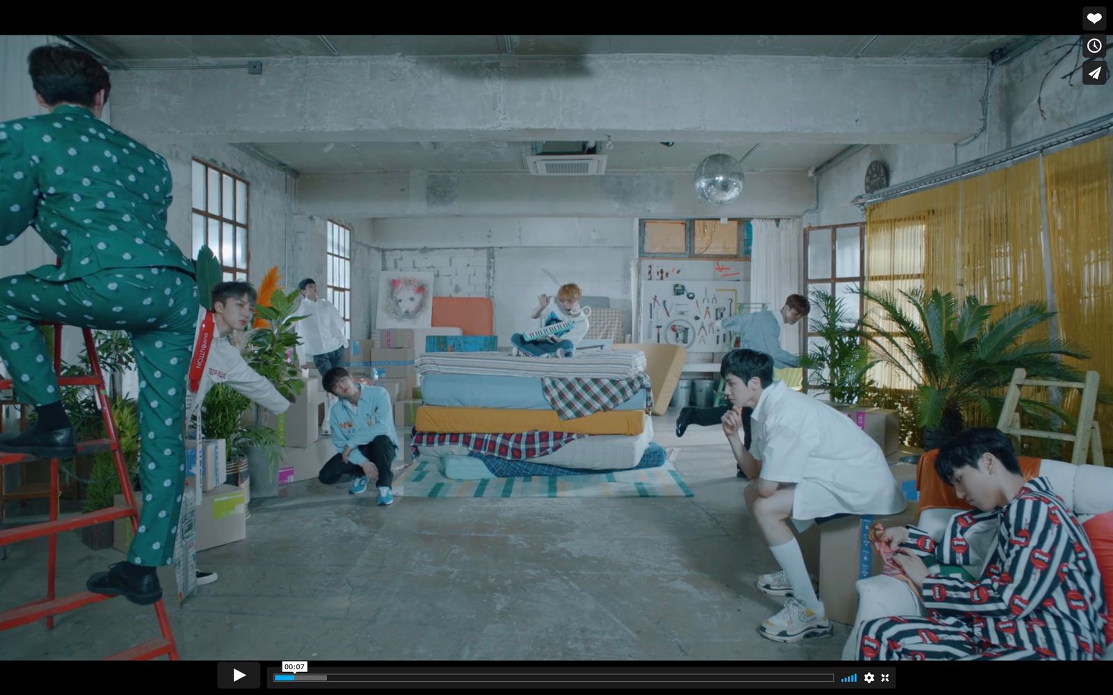 a group of people in a room with bunk beds