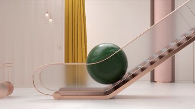 a green ball sitting on top of an escalator