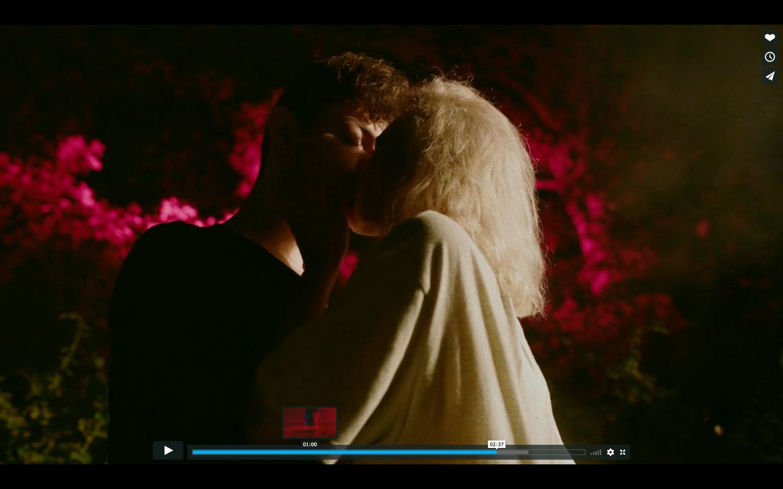 a man and a woman standing next to each other