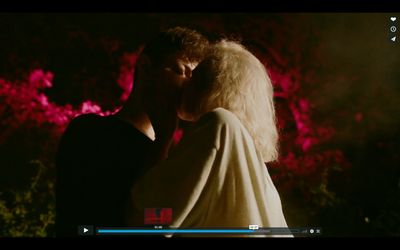 a man and a woman standing next to each other