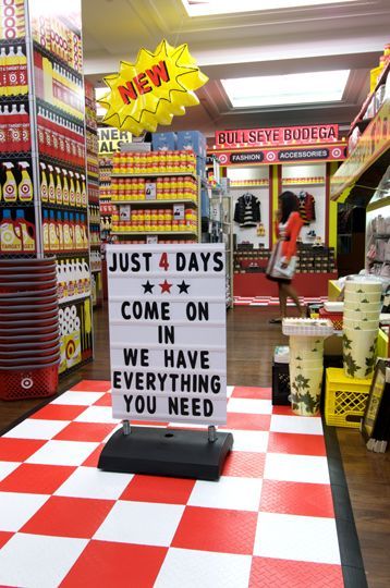 a red and white checkered table in a store