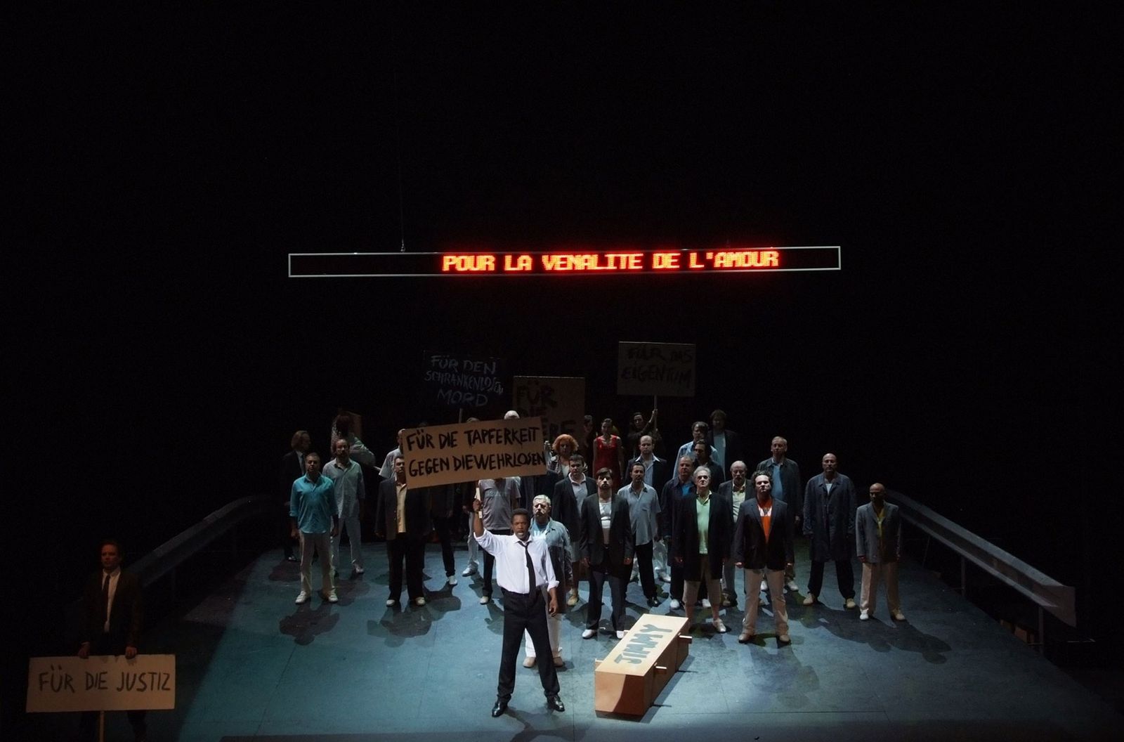 a group of people standing on top of a stage