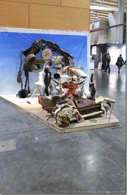 a group of sculptures on display inside of a building