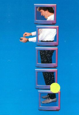 a man standing on top of a ladder holding a yellow frisbee