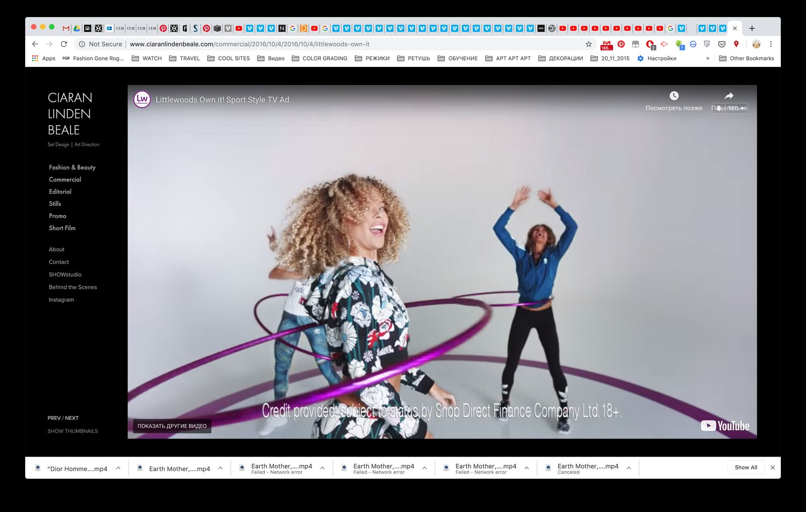 a woman and a man are dancing in front of a computer screen