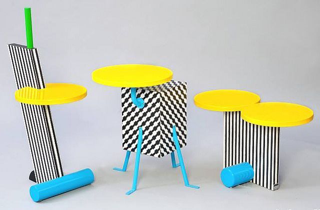 a group of three tables and stools in different colors