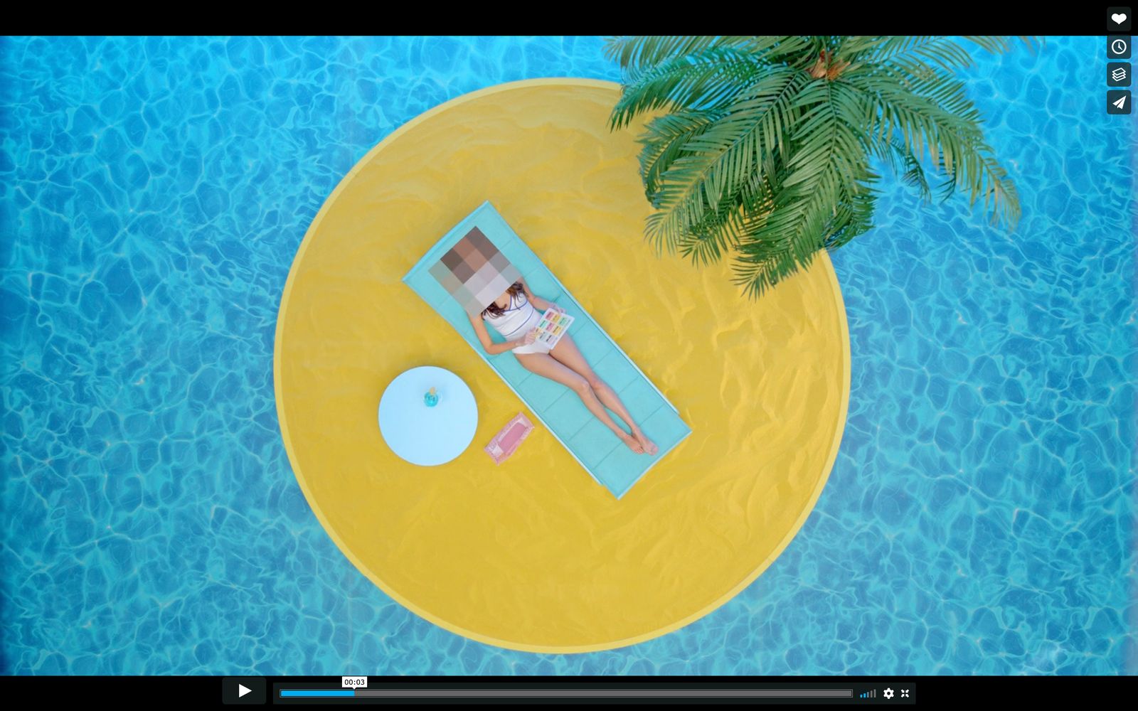 a woman laying on top of a blue and yellow pool