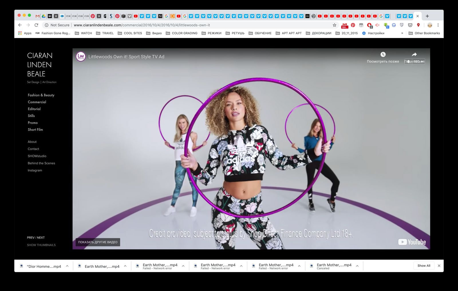 a woman in a black and white outfit is holding a hoop