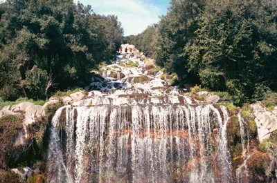 a large waterfall with lots of water cascading down it