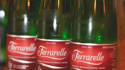 three bottles of ferrarella on a table