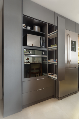 a kitchen with stainless steel appliances and cabinets