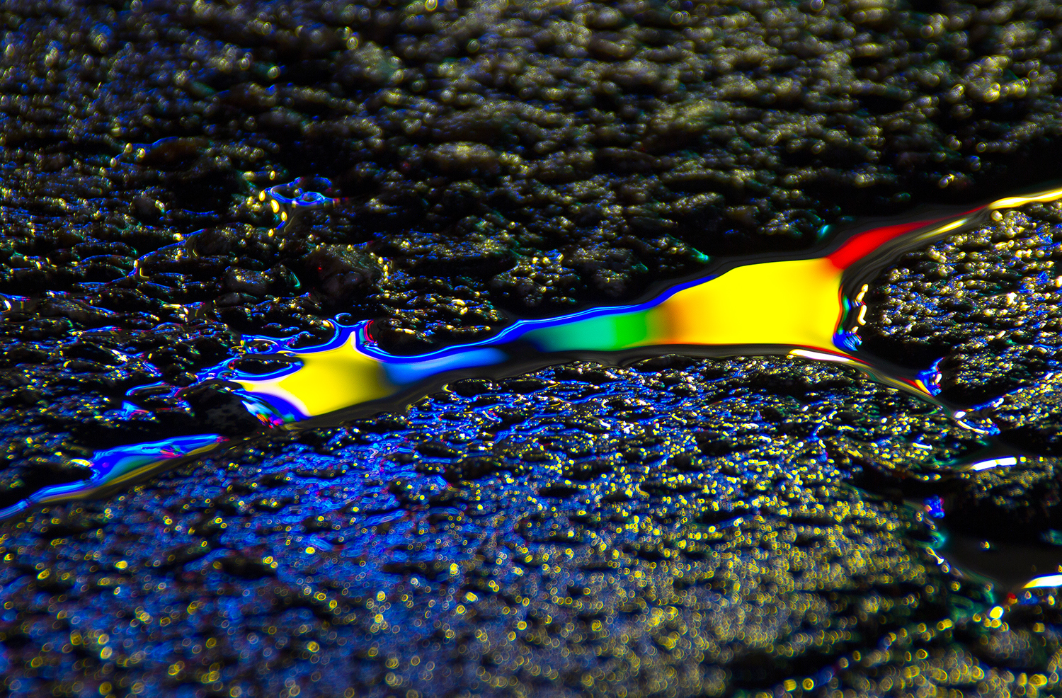 a close up of a colorful object on the ground