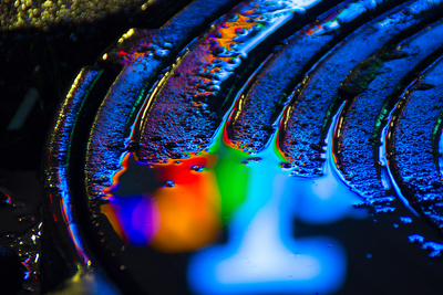 a close up of a rainbow colored object