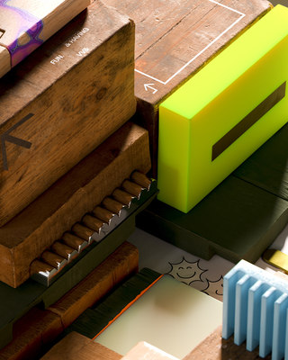 a close up of a wooden box with a ruler on top of it