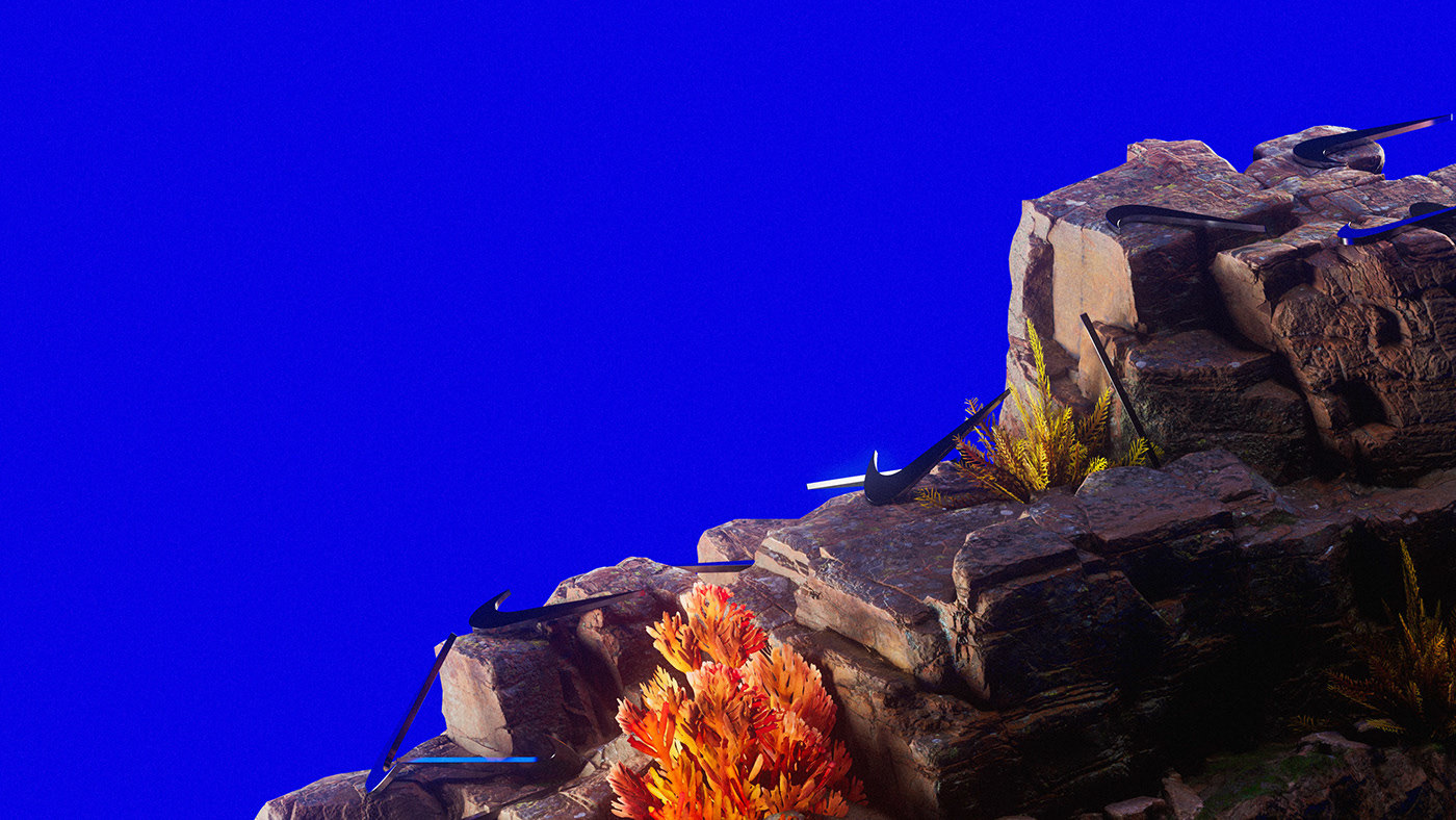 a blue sky with some rocks and plants