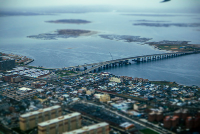 an aerial view of a bridge over a large body of water