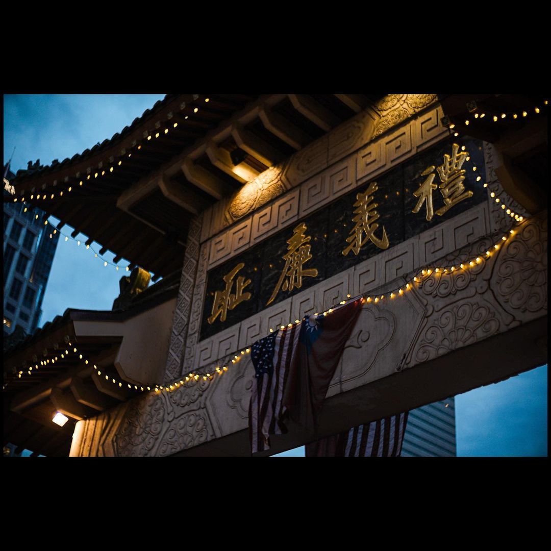 a building with a flag hanging from it's side