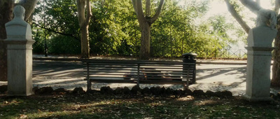 a park bench in the middle of a park