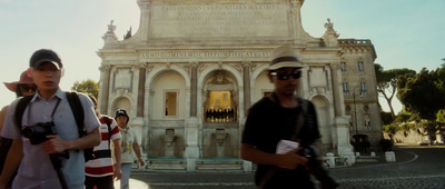 a group of people standing in front of a building