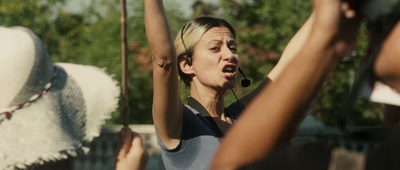 a woman holding a pole in her hands