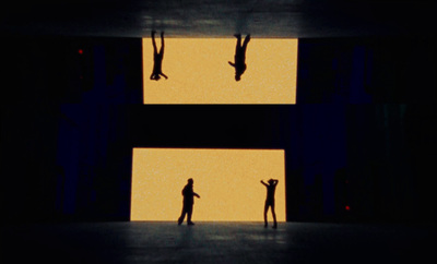 a couple of people standing on top of a stage