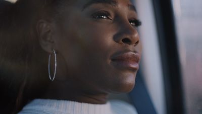 a close up of a person sitting in a car