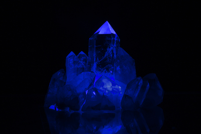 a blue ice sculpture sitting on top of a table