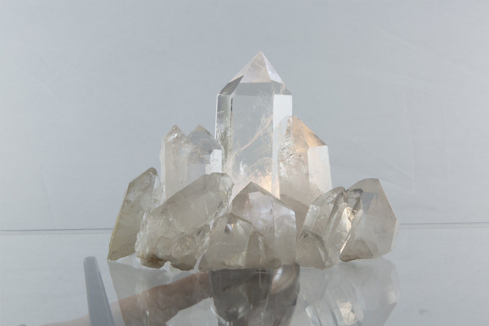 a cluster of crystals sitting on top of a table