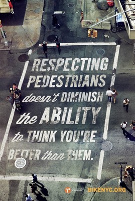 an overhead view of a street with a message painted on it