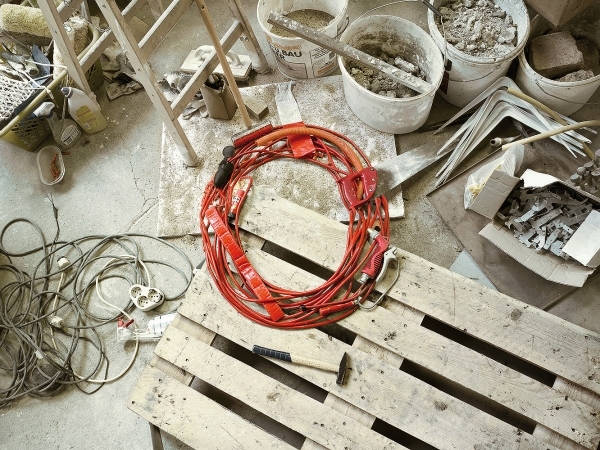 a wooden pallet filled with lots of tools