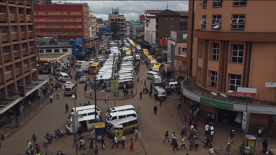 a busy city street filled with lots of traffic