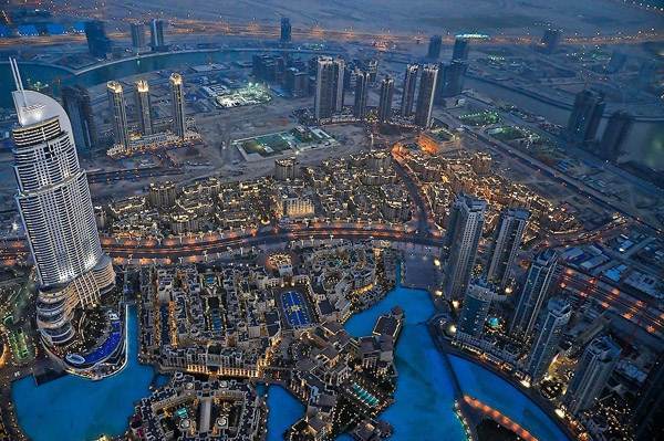 an aerial view of a city at night