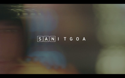 a blurry photo of a man's face with the word san tigo