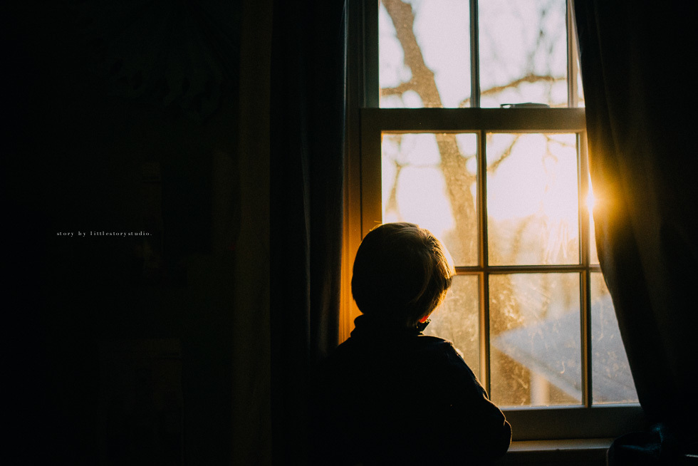 a person standing in front of a window