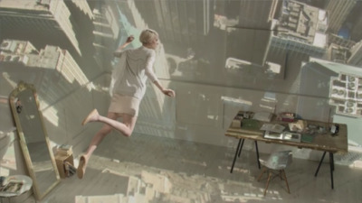 a woman in a white dress is jumping in the air