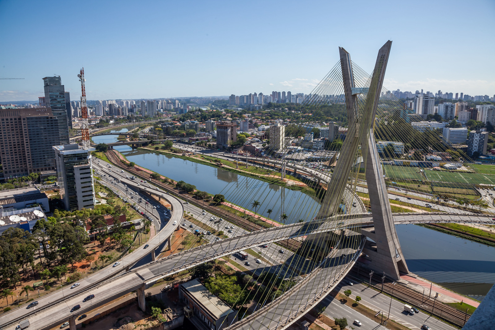 an aerial view of a bridge over a river