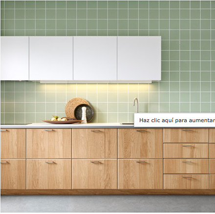 a picture of a kitchen with green tiles