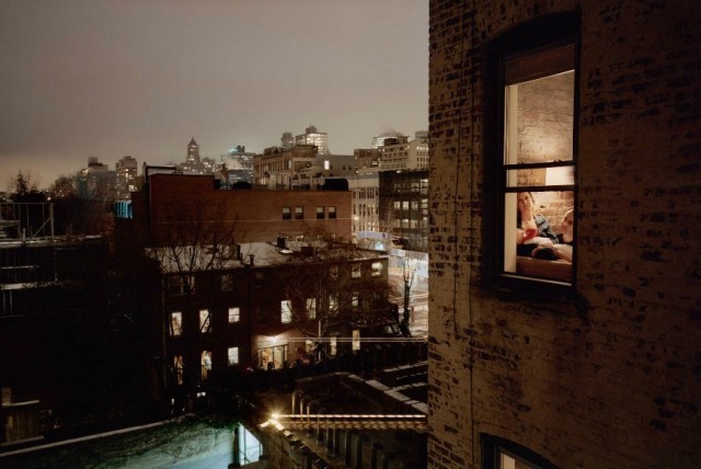 a view of a city from a window at night